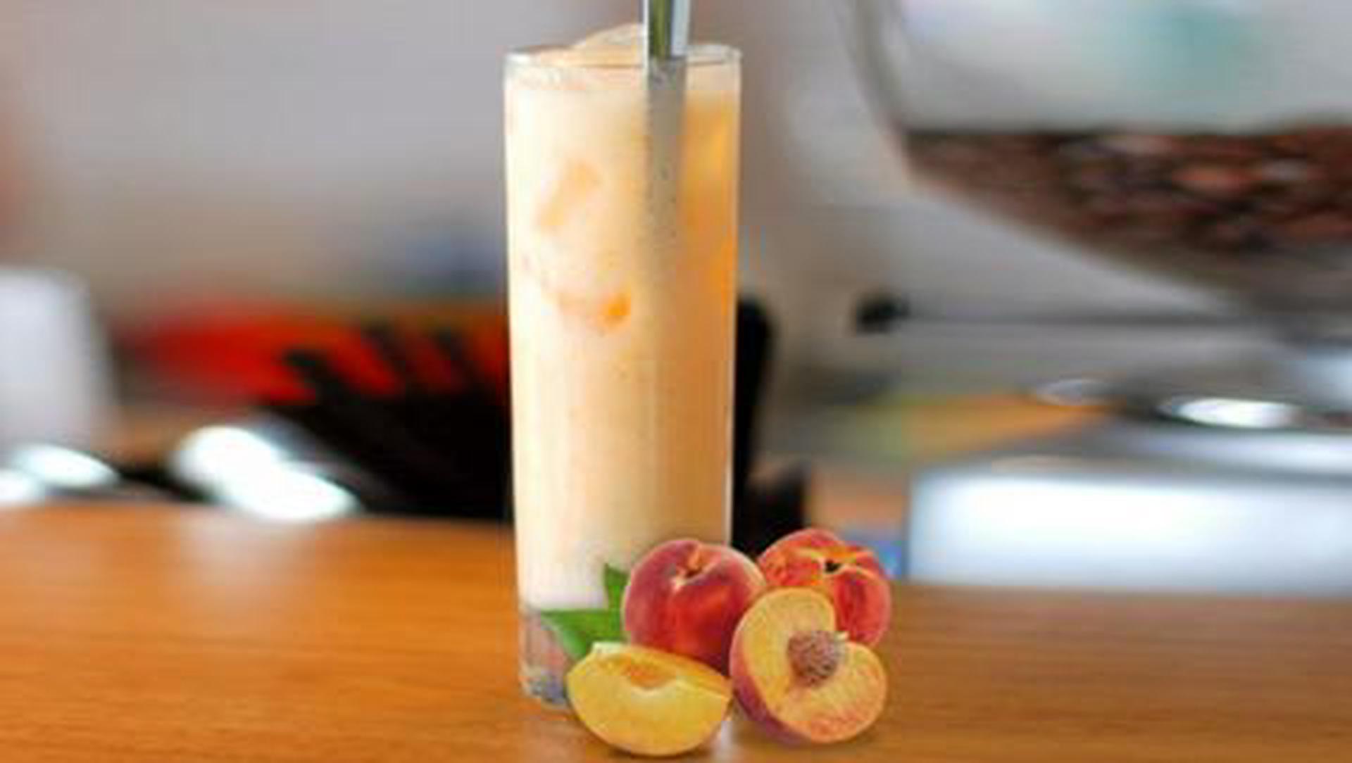 Hình ảnh trà sữa đào dầm ly 700ml