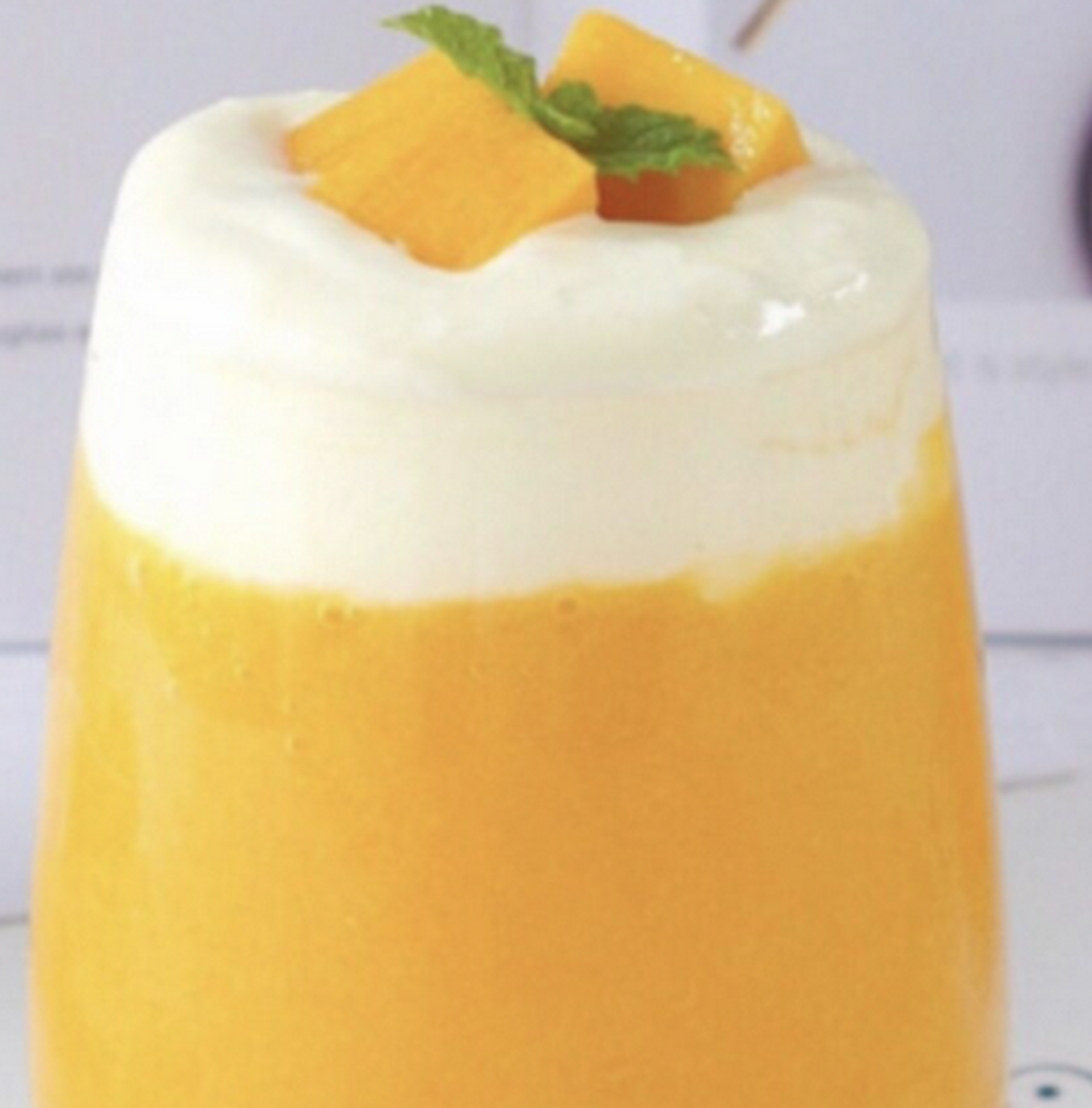 Hình ảnh Hồng trà xoài macchiato