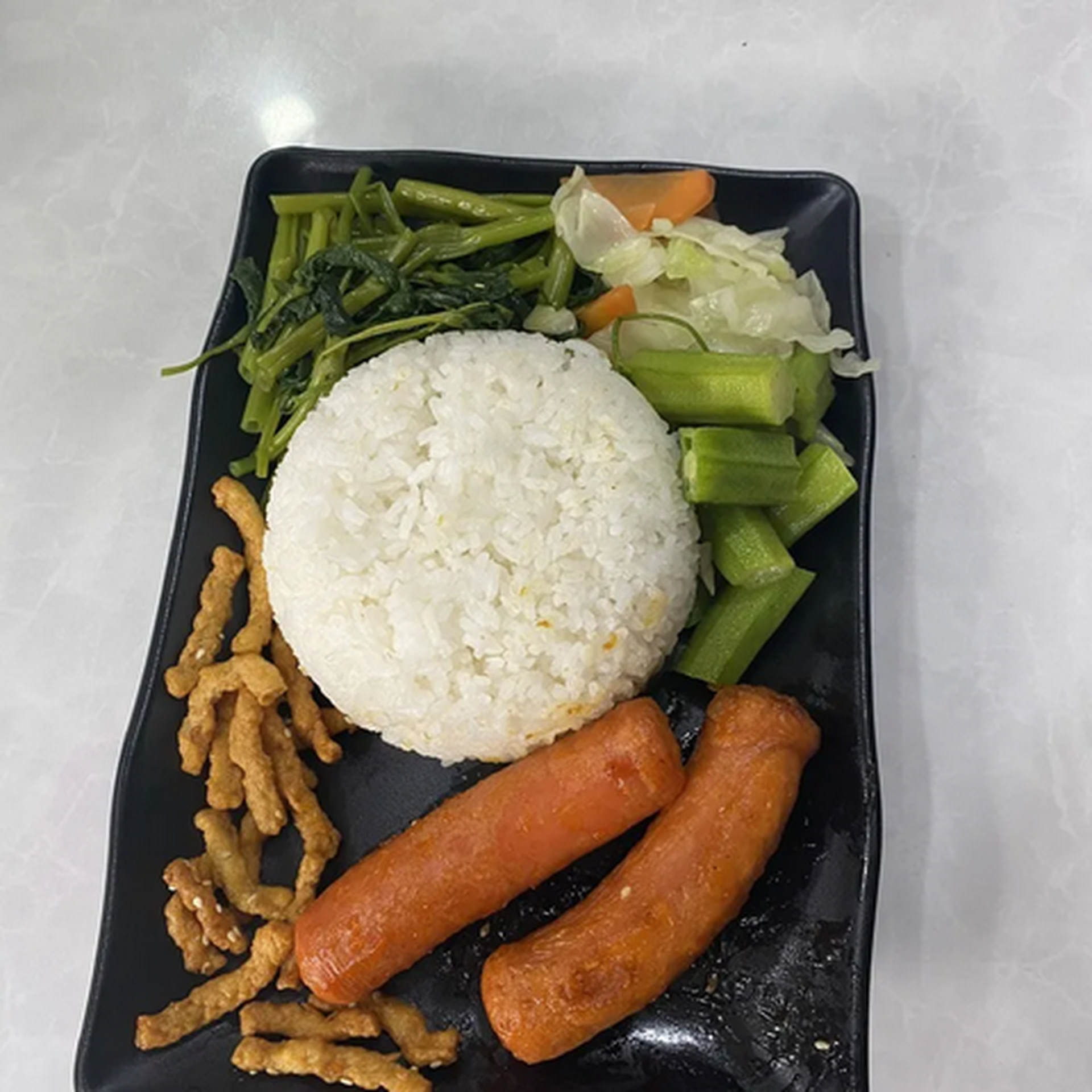 Hình ảnh Cơm xúc xích chay