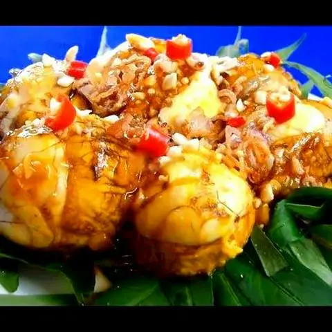 Hình ảnh Hột lộn xào bơ tỏi