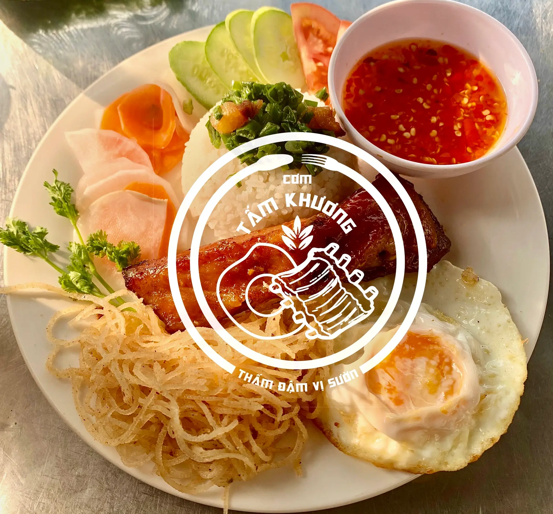 Hình ảnh Cơm tấm sườn cọng + ốp la + bì 
