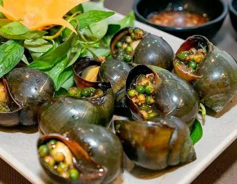 Hình ảnh Ốc bươu nướng tiêu xanh
