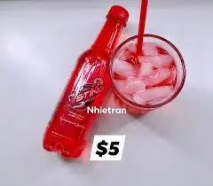 Hình ảnh 1 chai Sting dâu + kèm ly đá 