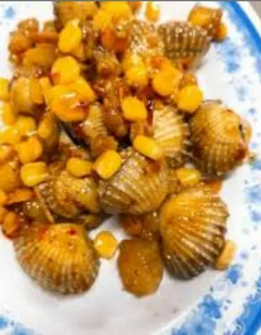 Hình ảnh sò huyết xào bơ bắp 