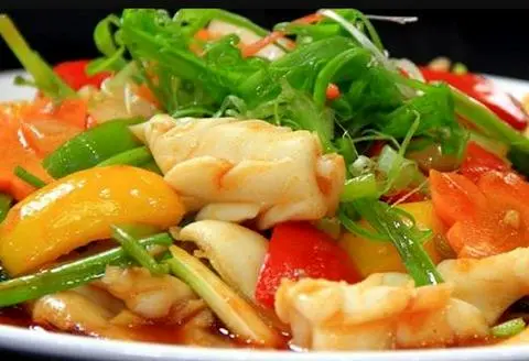 Hình ảnh Cơm niêu mực xào chua ngọt