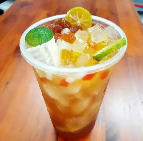 Hình ảnh Trà dứa size khổng lồ full topping trân châu
