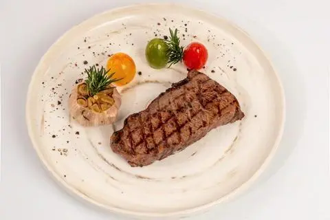 Hình ảnh Grilled angus striploin with signature sauce