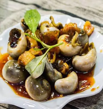 Hình ảnh ốc mở xào me