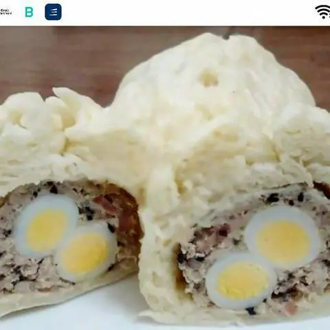 Hình ảnh Bánh bao 2 trứng cút - hấp nóng