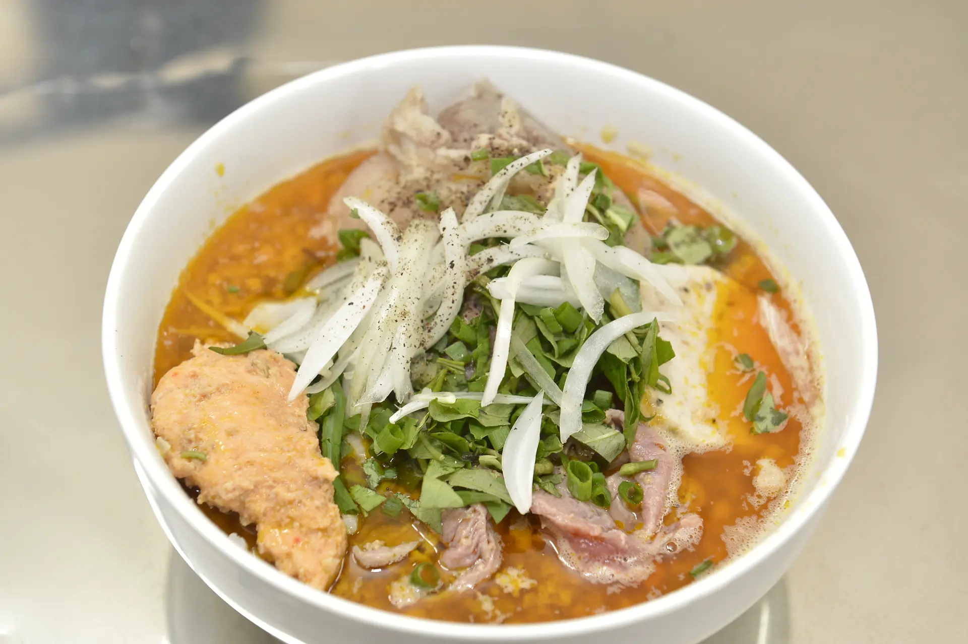 Hình ảnh Bún nạm tái gân viên