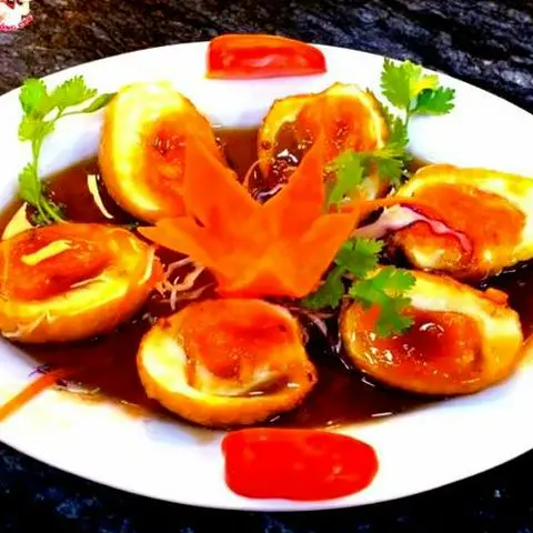 Hình ảnh Trứng lòng đào sốt me