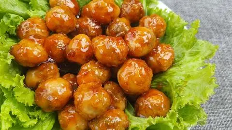 Hình ảnh Trứng cút chiên sốt mắm tỏi