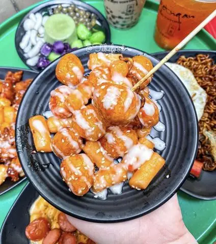 Hình ảnh Trứng cút sốt mật ong - bánh gạo