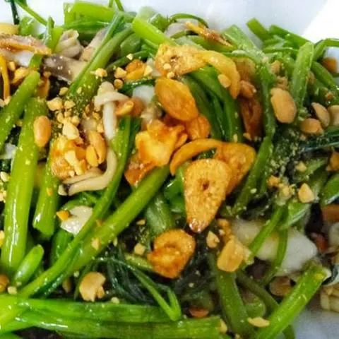 Hình ảnh Tu hài xào rau muống 