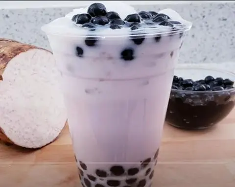 Hình ảnh sữa tươi trân châu đường đen khoai môn 