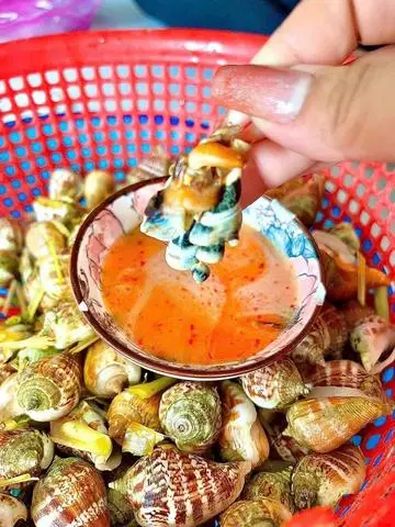Hình ảnh ốc nhảy hấp xã kèm nước chắm thần thánh