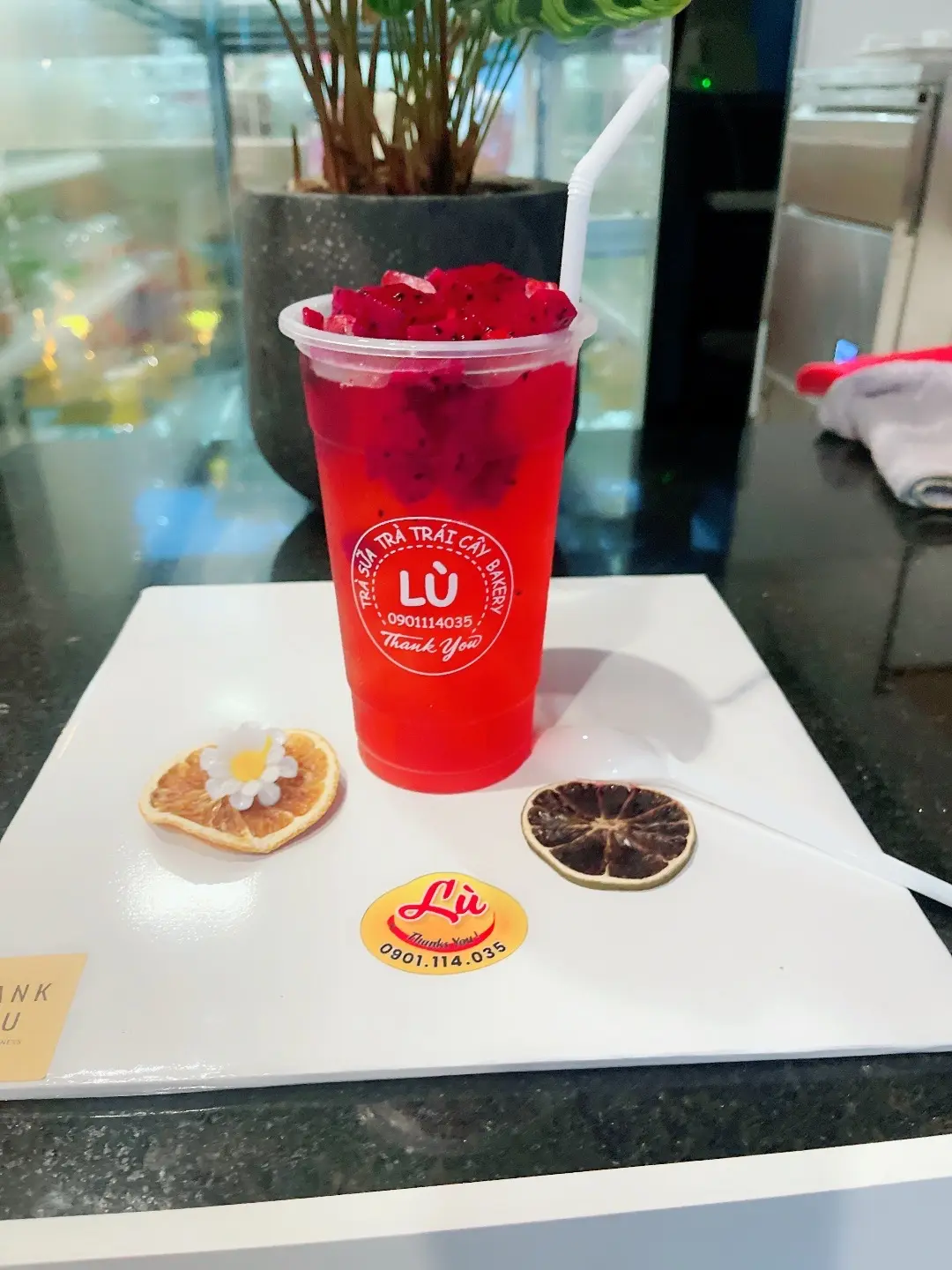 Hình ảnh Trà lựu đỏ thanh long