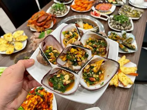 Hình ảnh Sò sữa nướng mỡ hành