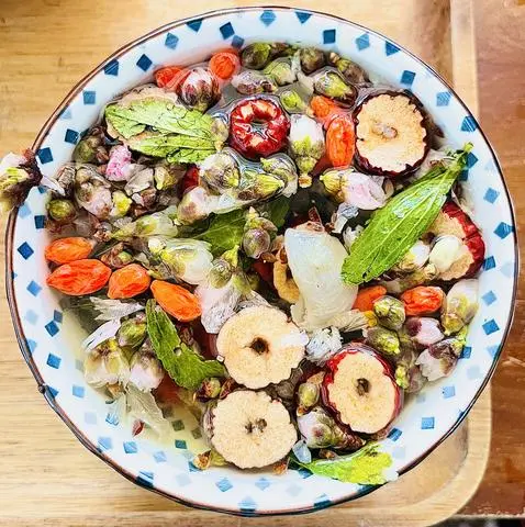 Hình ảnh Trà Long Nhãn mix Anh Đào (Trà thảo mộc nóng -Không đá)