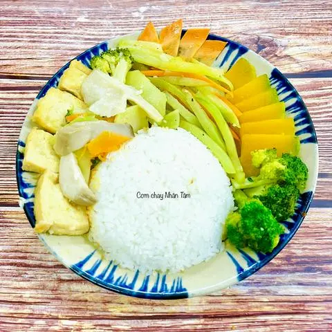 Hình ảnh Cơm đậu hủ xào nấm rau củ chay