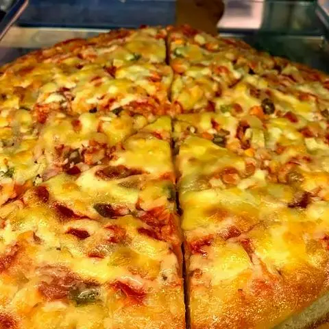 Hình ảnh Pizza thập cẩm tam giác