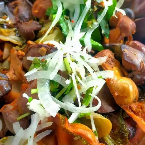 Hình ảnh Cơm lòng gà xào cải chua