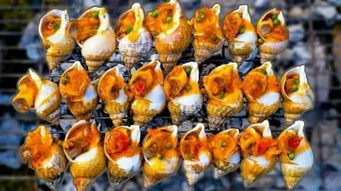 Hình ảnh ốc bu lót nướng tiêu xanh một con