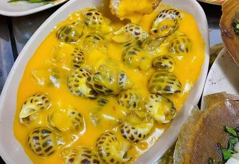 Hình ảnh ỐC HƯƠNG XÀO PHÔ MAI TRỨNG MUỐI