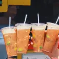 Hình ảnh Hồng Trà Đào Mật Ong Ly 750ml