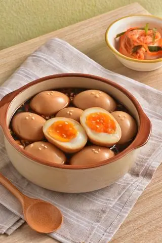 Hình ảnh [NHỎ] Trứng Lòng Đào Ngâm Tương