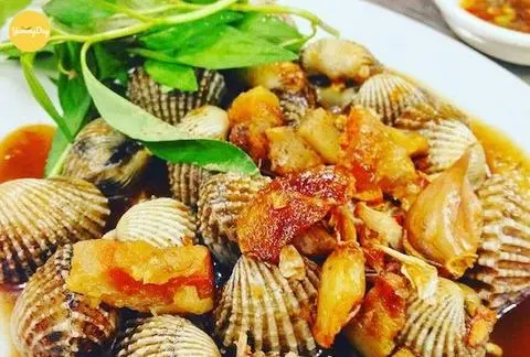 Hình ảnh Sò huyết xào me