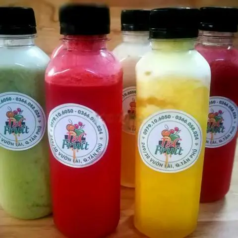Hình ảnh Nước Ép Chai Bưởi + Dứa