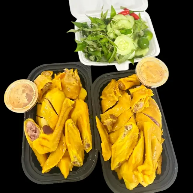 Hình ảnh Nửa con gà ta có đầu, chân + dưa leo, rau răm, nước chấm