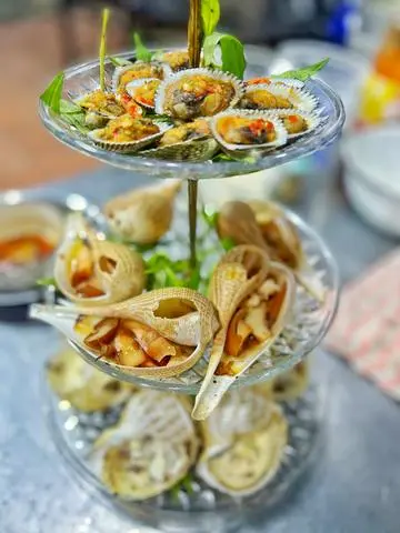 Hình ảnh Ngêu hấp thái- ốc bông xào bắp bơ- còi sò điệp kim sa