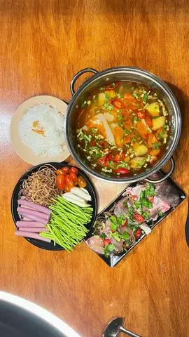Hình ảnh Lẩu cá bóp măng chua