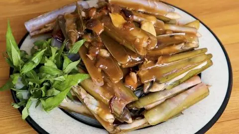 Hình ảnh ốc móng tay xào me 