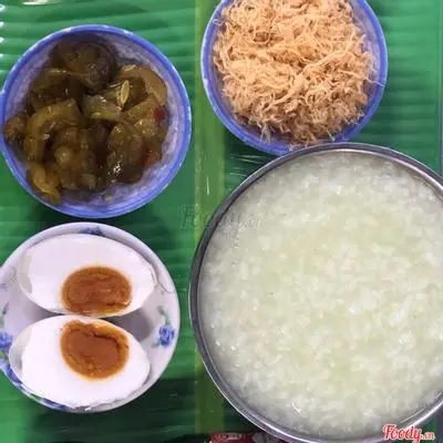 Hình ảnh Cháo trắng - trứng muối - dưa - chà bông