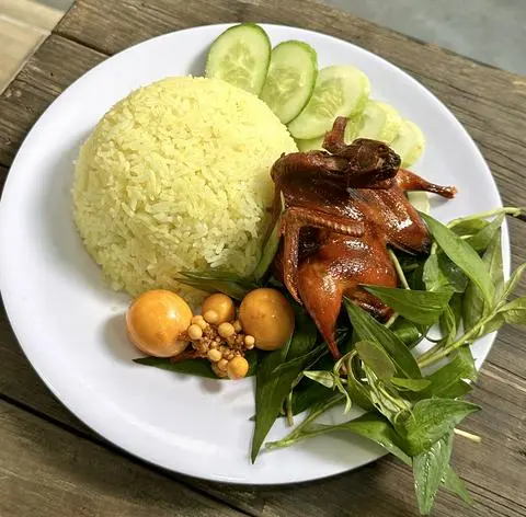 Hình ảnh Cơm cút chiên bơ + trứng non