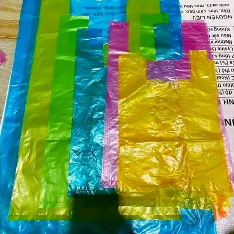 Hình ảnh Túi Nilong 1Kg, Túi Quai Màu Size 27cm, Túi Xốp Bóng