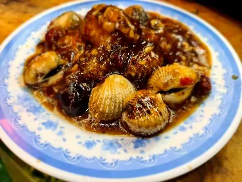 Hình ảnh Sò huyết xào me