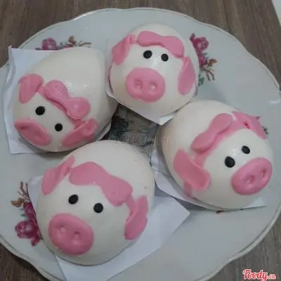 Hình ảnh Bánh bao Heo Cài Nơ Trứng Sữa
