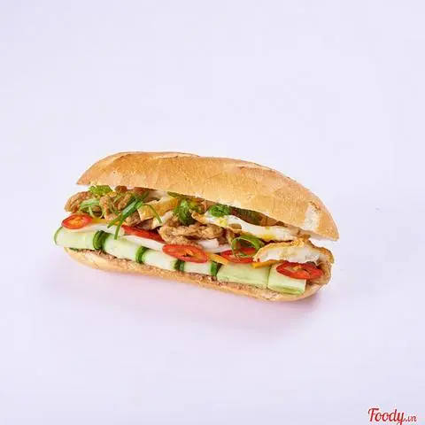 Hình ảnh Bánh Mì Chả Cá Thêm Ốp La