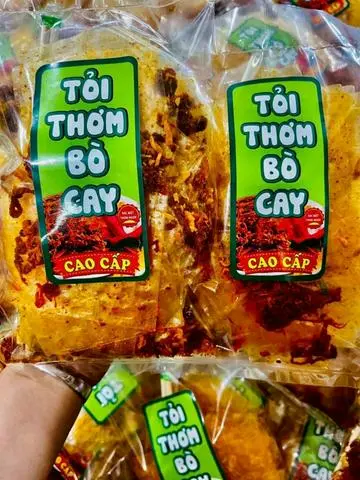 Hình ảnh Bánh tráng tỏi thơm bò cay