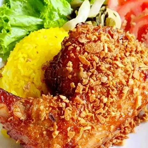 Hình ảnh Cơm đùi gà góc tư sốt mắm tỏi