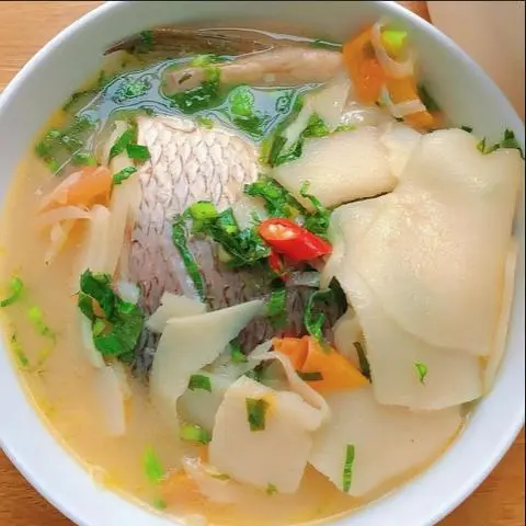 Hình ảnh Cơm canh chua đầu cá lóc nấu măng