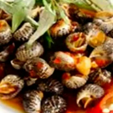 Hình ảnh Ốc Bông Xào Bơ Cay