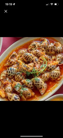 Hình ảnh ốc hương xào me 