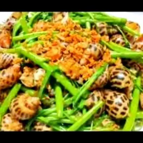 Hình ảnh Ốc hương xào rau muống