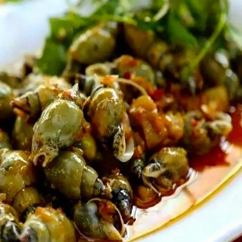 Hình ảnh Ốc Cà Na Xào Bơ Cay