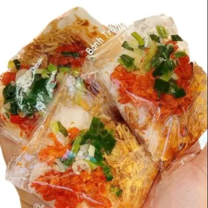 Hình ảnh 2 bịch mini bánh tráng bơ mỡ hành 